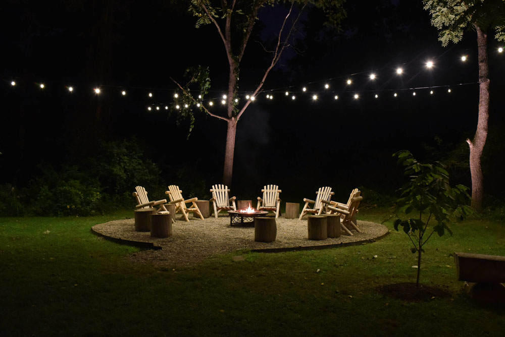 Outdoor gathering area with lighting